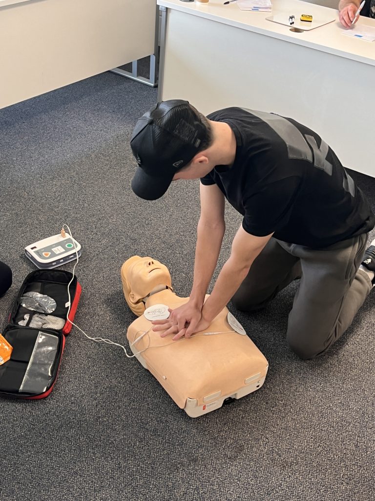 CPR performed on a first aid manikin - 4-Part STCW Basic Safety Training